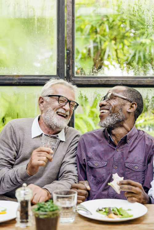 Two old men eating lunch