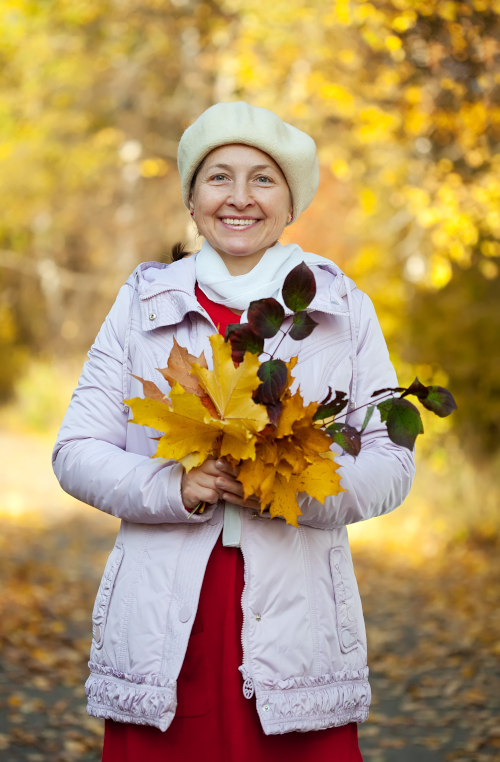 Woman holding leaves