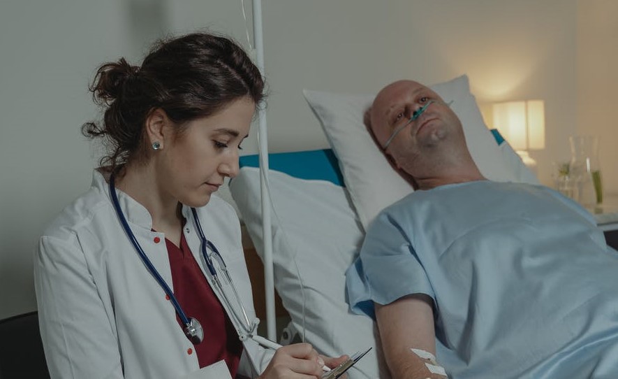 doctor talking with patient