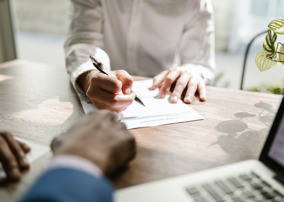 Person reviewing insurance documents