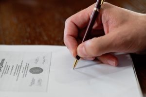 Person signing document