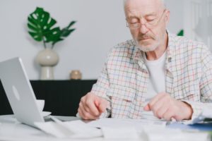 Senior man reviewing finances