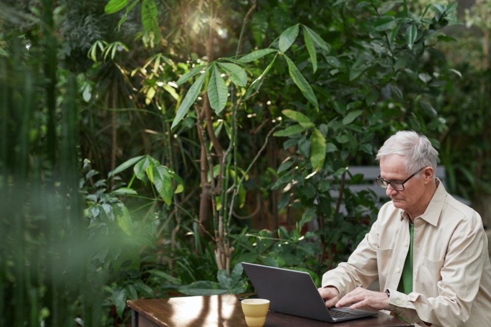 Senior looking at laptop