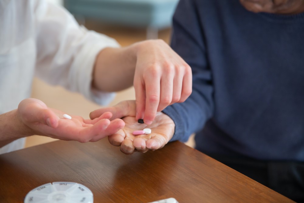 person getting medication in a nursing home