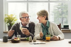 Senior couple eating brunch