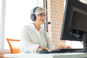 Senior woman working from home on the computer