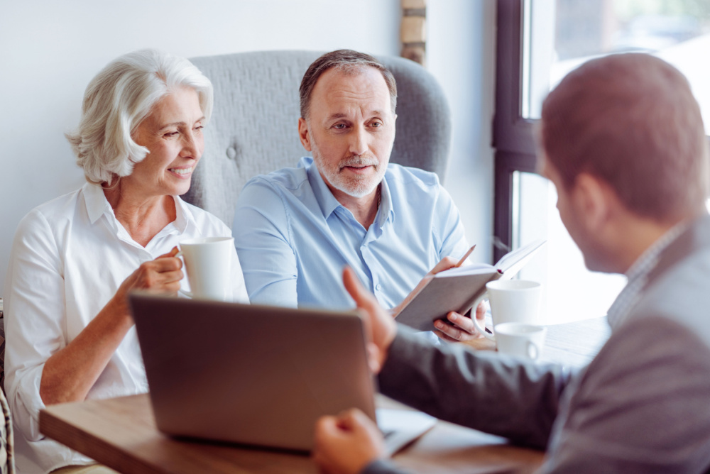 Senior couple meeting with financial advisor